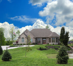 Home With Green Grass & Blue Sky
